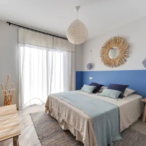 Vignette chambre bleue entre ciel et mer