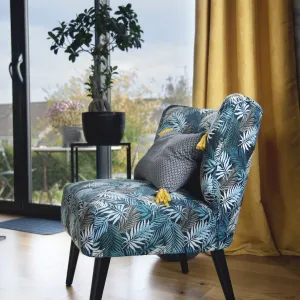 Vignette le fauteuil tapissé