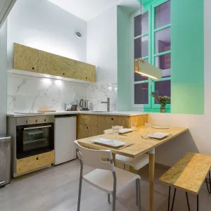 Vignette Un studio habillé d'OSB dans le pentes à Lyon